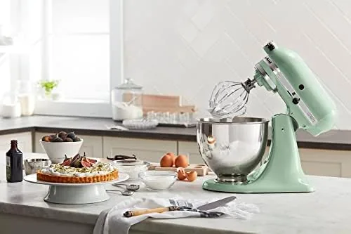 Dough being kneaded on the dough hook in the mixer bowl