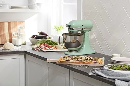 Artisan mixer next to a larger bowl lift model