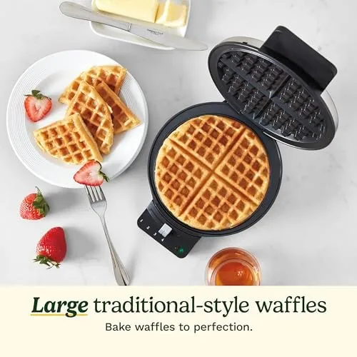 Close up of the brushed stainless housing and the browning control dial on the waffle maker
