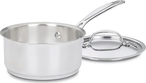 The Cuisinart 1.5 quart stainless steel saucepan with its lid on a stovetop