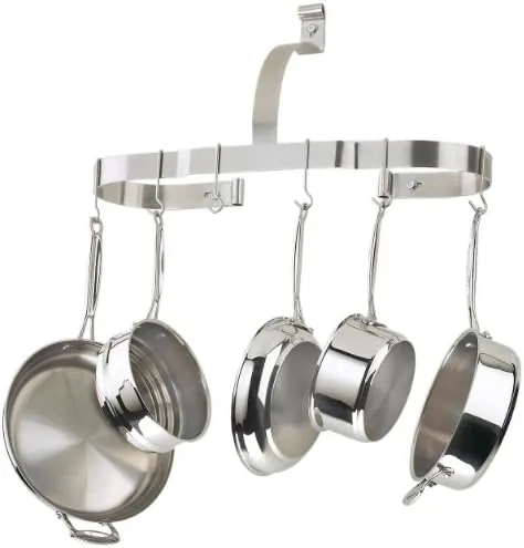 A 12 inch frying pan being hung from the pot rack during daily use