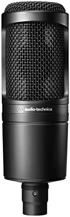 The Audio-Technica AT2020 condenser microphone standing upright on a desk