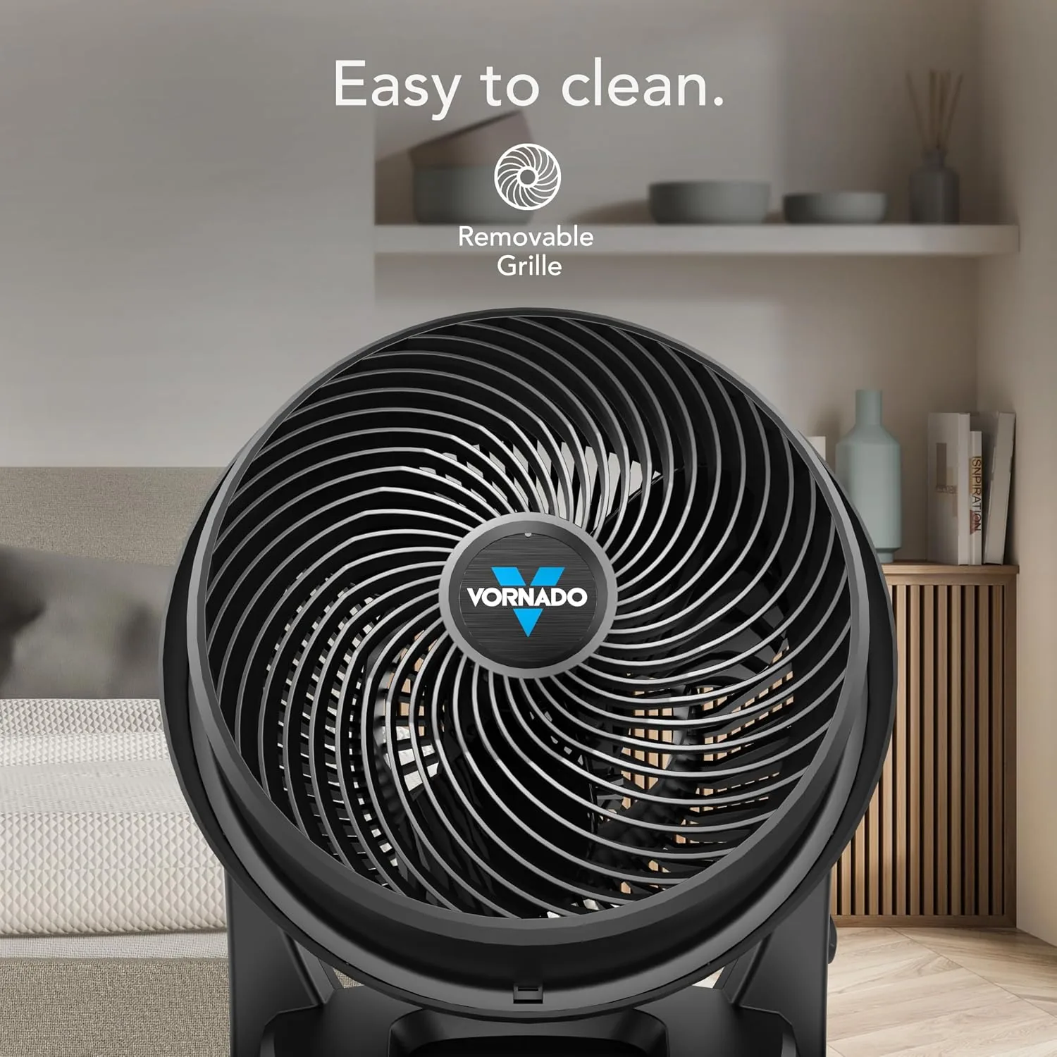 The Vornado 630 next to a pedestal fan and a box fan for comparison