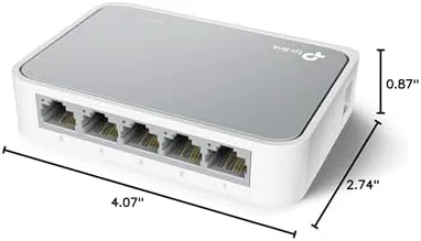 The TL-SF1005D tucked behind a TV stand connecting a streaming box and console