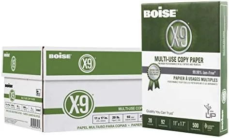 Closed case of Boise X-9 ledger size printer paper on an office shelf