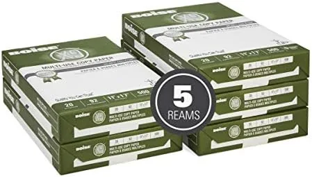 Reams of Boise X-9 paper stacked with the wrapper opened