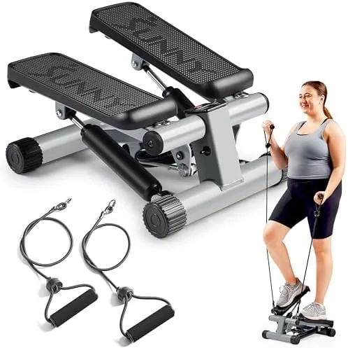 The Sunny mini stair stepper sitting in a corner of a living room