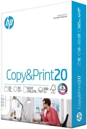 Ream of HP 8.5 x 11 printer paper on an office copier tray
