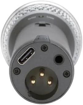 A person recording into the Q2U while sitting at a desk