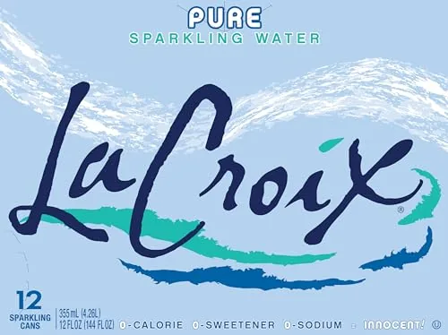 La Croix Pure poured into a glass with fine rising bubbles