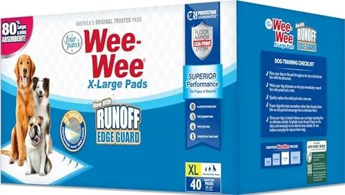 Folded stack of Four Paws Wee-Wee Superior Performance X-Large pads next to a puppy