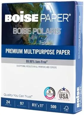 A laser printed test page and a color brochure lying on the Boise paper