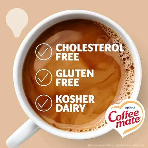 A mug of coffee creamed with a Coffee mate single packet