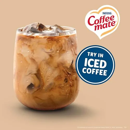 Coffee mate singles next to a bottle of liquid creamer and a canister