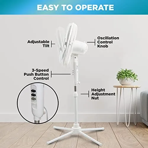 The pedestal fan lowered to desk height and aimed at a home office setup