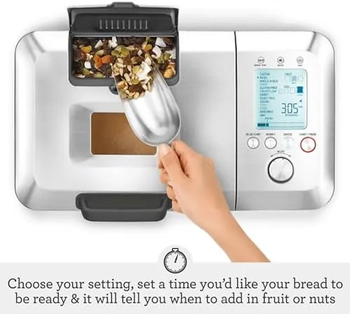 Collapsible kneading paddle mechanism inside the bread maker