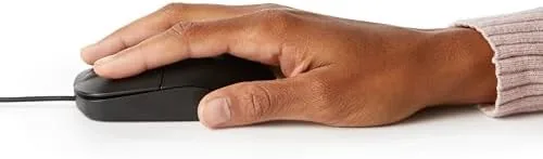 Wired mouse in active use during office work on a spreadsheet