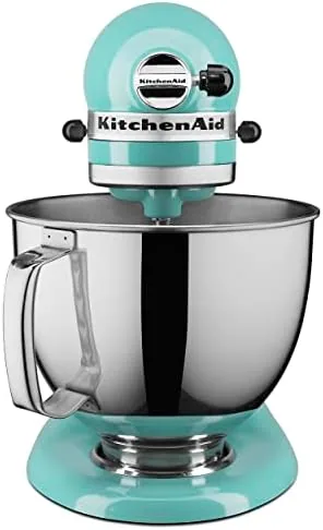 Close up of the tilt head mechanism with the mixer arm swung back from the bowl