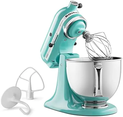 The pouring shield fitted over the bowl while flour is added during mixing
