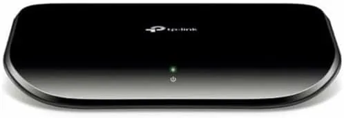 The TP-Link TL-SG1005D five port gigabit switch resting on a desk