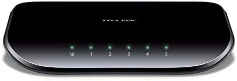 The switch connected between a modem and a desktop in a home office