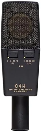 The microphone on a stand showing the large gold diaphragm through the grille