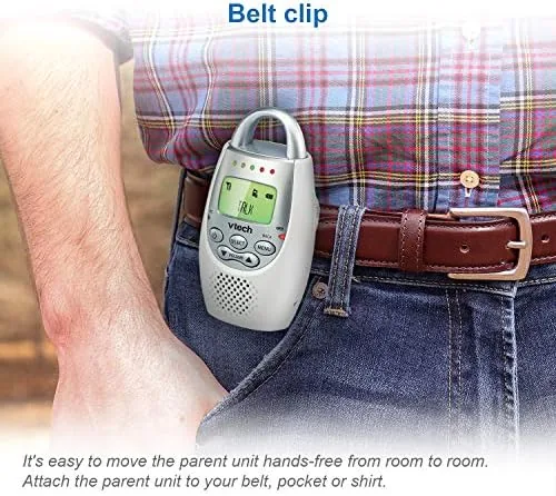 A parent carrying the handheld unit across the house while it stays connected