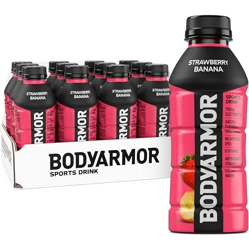 A 12 pack box of BODYARMOR Strawberry Banana bottles on a kitchen counter