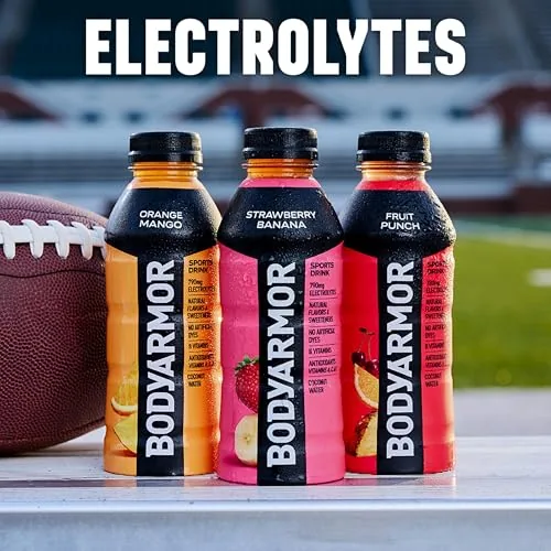 A bottle of BODYARMOR on a picnic table after a hike
