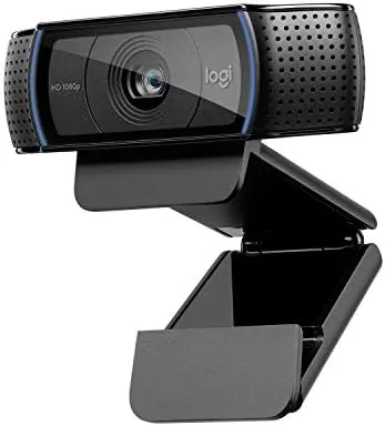 The Logitech C920 HD Pro webcam in black lying on a clean desk
