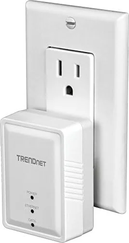 The powerline adapter connected to a router with an Ethernet cable during testing