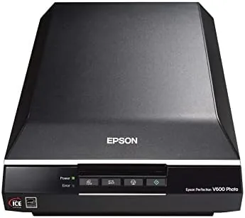 The Epson Perfection V600 scanner closed on a desk with its lid closed