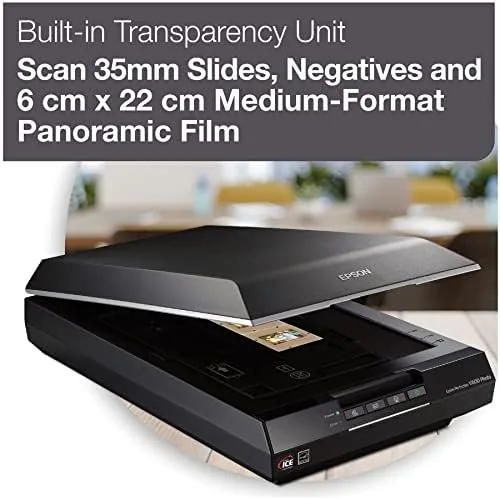 A film strip lying in the transparency tray with the scan preview on the software