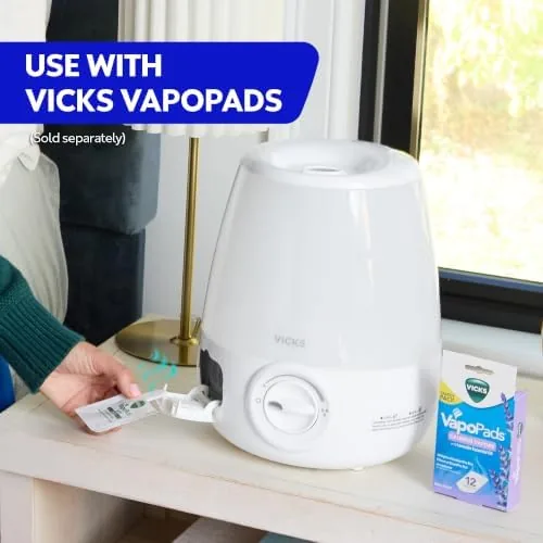 A log sheet with nightly humidity readings next to the humidifier