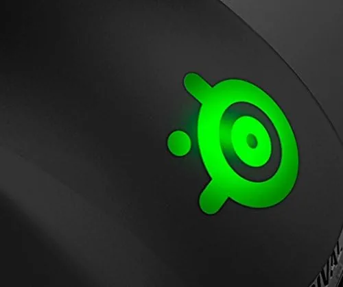 The underside of the SteelSeries Rival showing the optical sensor and glide feet