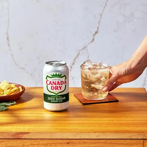 A family dinner table with a can of Canada Dry Zero Sugar at each place setting