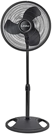 The Lasko 16-inch floor fan standing at full height in a living room
