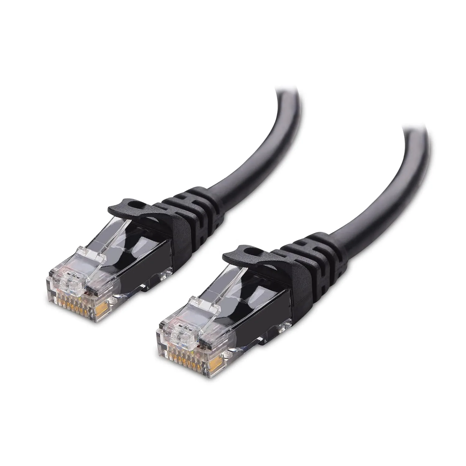 A coil of the black 20 foot Cat 6 ethernet cable on a desk