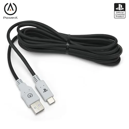 A person gaming on the couch with the controller connected to the PowerA cable