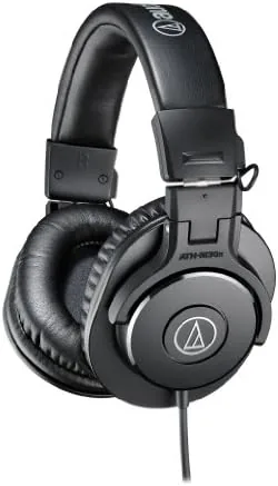 The Audio-Technica ATH-M30x headphone resting on a workbench