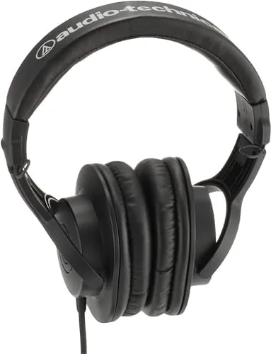 A mixing session in a home studio with the ATH-M20x on a headphone stand