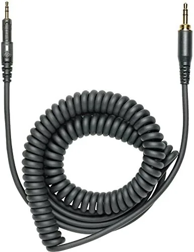 The ATH-M40x connected to a small audio interface at a desk