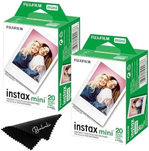 Two sealed Instax Mini film packs and the Balveli microfiber cloth on a table
