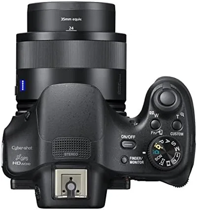 Close up of the HX400V grip, mode dial, and the pop up electronic viewfinder