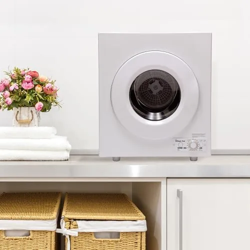Neatly folded laundry beside the compact dryer