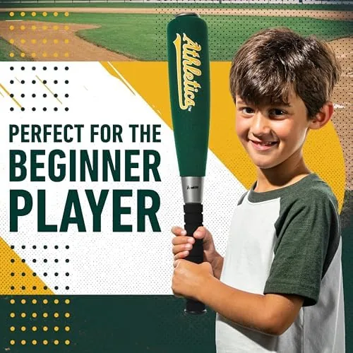 A child swinging the jumbo foam bat at a soft ball in the backyard
