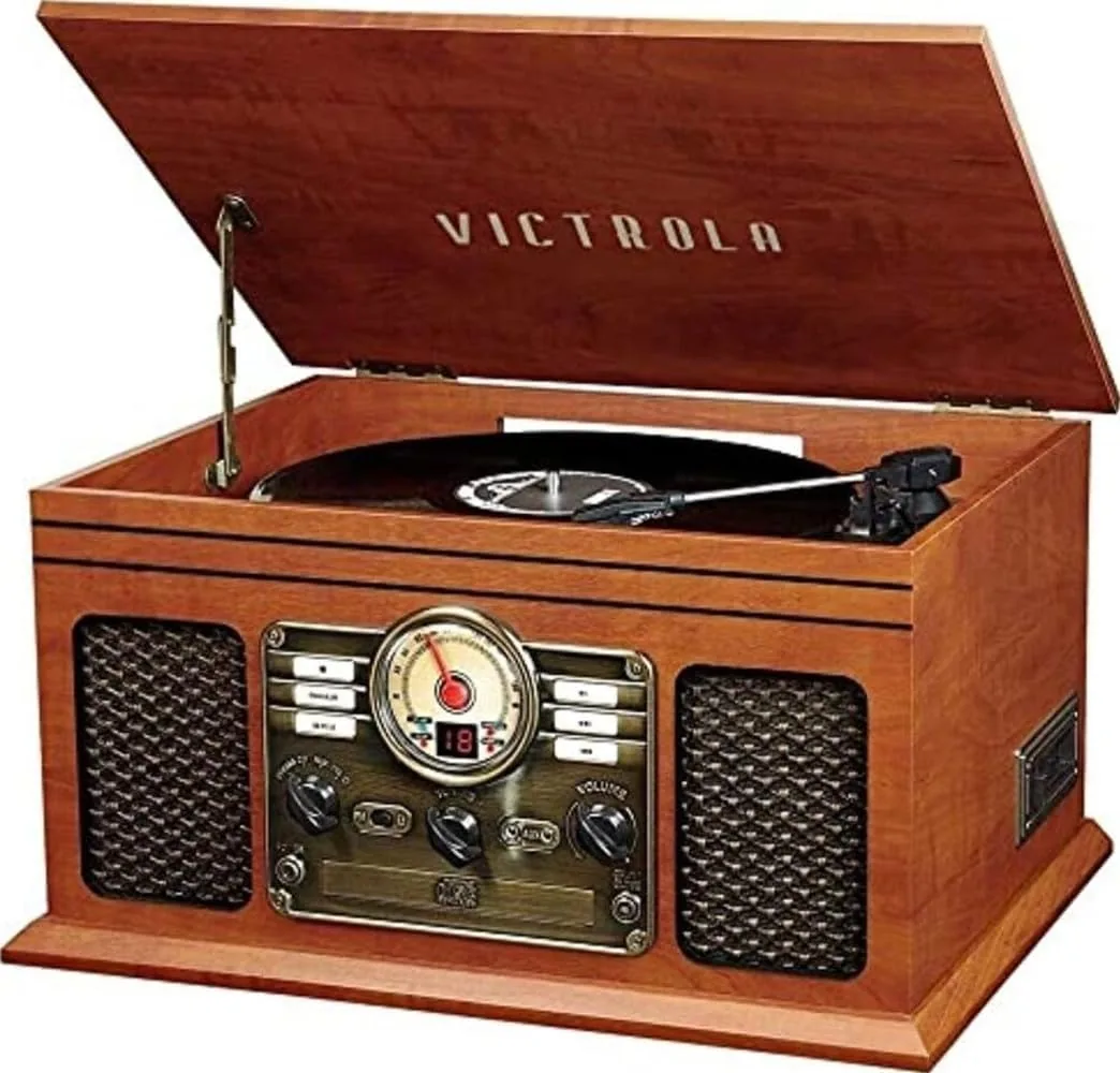 The Victrola Quincy 6-in-1 record player in mahogany finish with its lid open