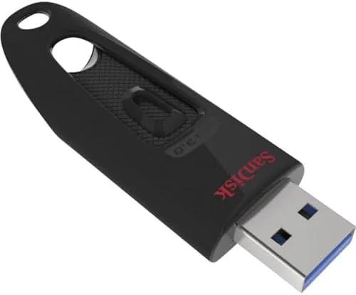 The SanDisk Ultra attached to a keychain next to keys