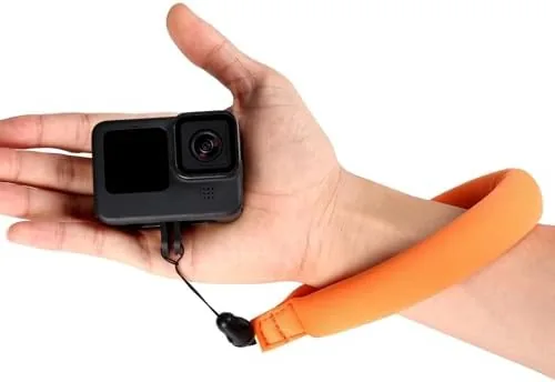The float attached to a GoPro style camera body resting on the water surface