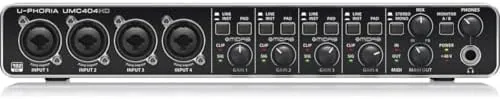 A condenser microphone plugged into the first input of the UMC404HD